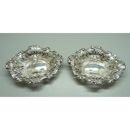 861 - A pair of embossed silver dishes, 56g