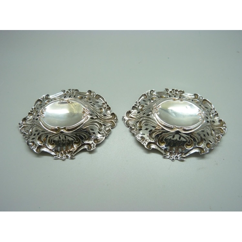 861 - A pair of embossed silver dishes, 56g