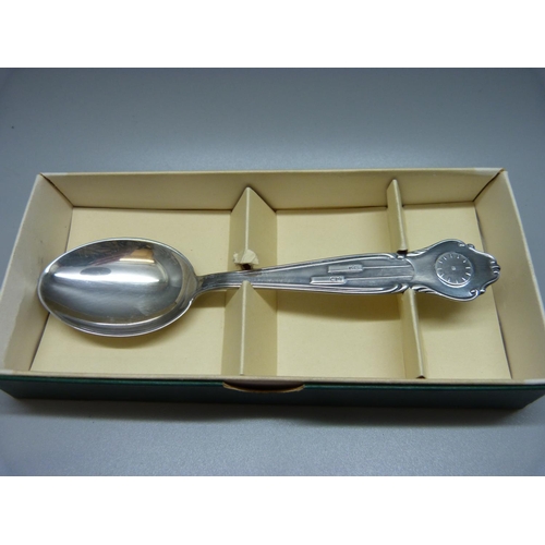 889 - A silver Christmas christening spoon, one other silver spoon and two smaller, 83g