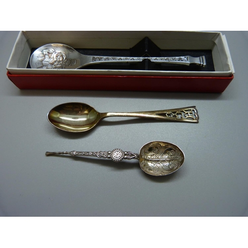 889 - A silver Christmas christening spoon, one other silver spoon and two smaller, 83g