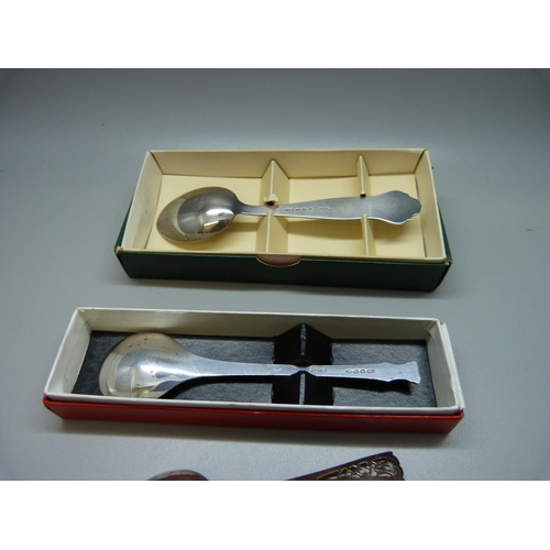 889 - A silver Christmas christening spoon, one other silver spoon and two smaller, 83g