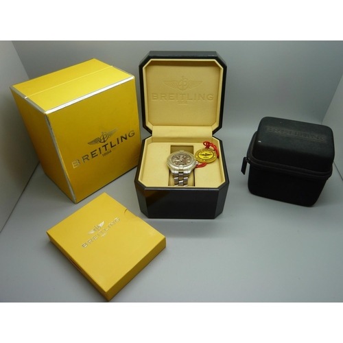 894 - A Breitling Colt chronometre wristwatch with box and papers, a/f, water damage