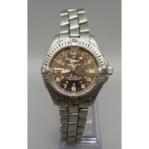 894 - A Breitling Colt chronometre wristwatch with box and papers, a/f, water damage