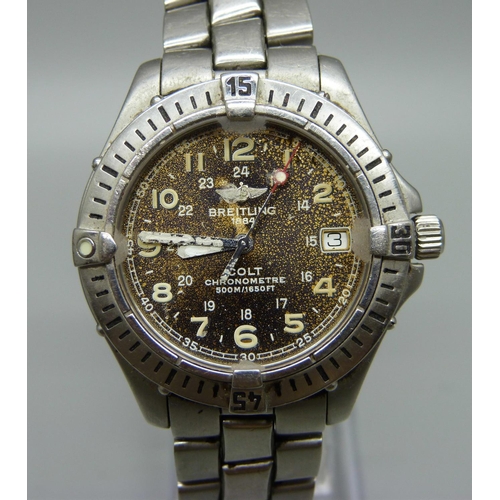 894 - A Breitling Colt chronometre wristwatch with box and papers, a/f, water damage