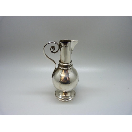 896 - A silver communion jug/flask, London 1872, 83g