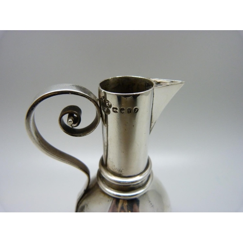 896 - A silver communion jug/flask, London 1872, 83g