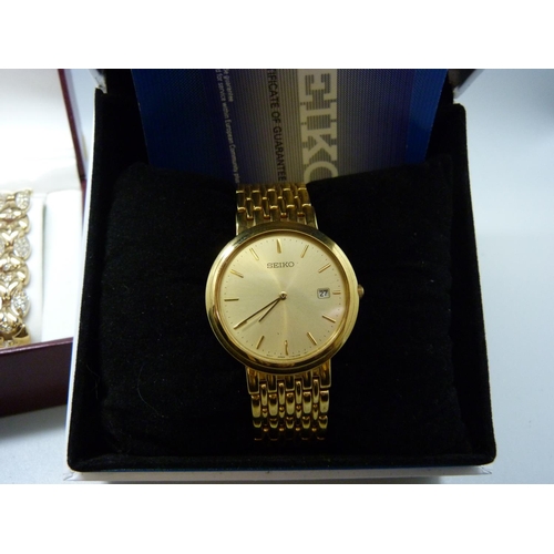 906 - A gentleman's Seiko wristwatch, boxed and a lady's Rotary wristwatch, boxed