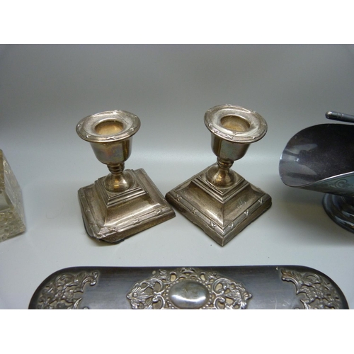 920 - A pair of silver candlesticks, a/f, a brush with applied silver decoration, a metal topped inkwell a... 