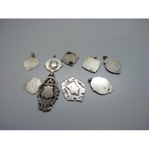 925 - Eight silver fobs and one other, 71g