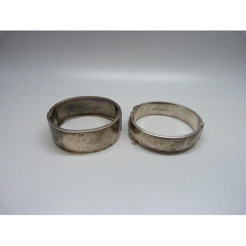 929 - Two silver bangles, 50g