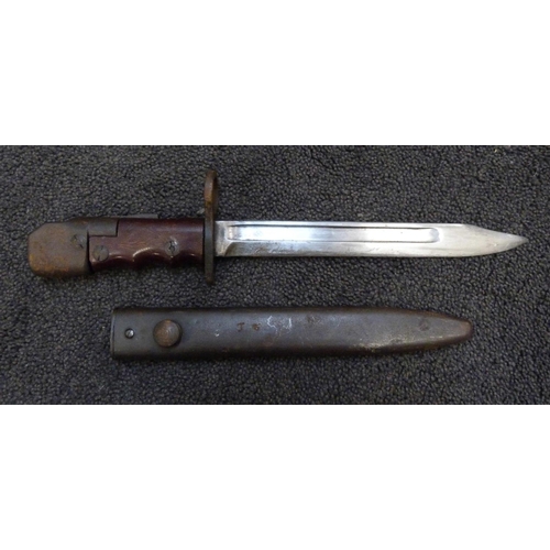 943 - A bayonet and scabbard