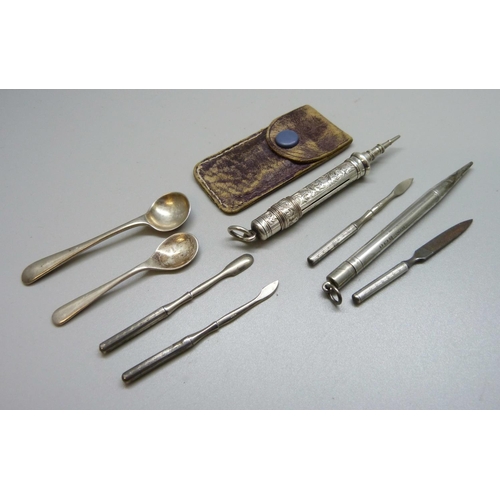 948 - Two Sampson Mordan silver pencils, a silver manicure set and salt spoons