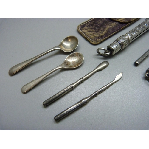 948 - Two Sampson Mordan silver pencils, a silver manicure set and salt spoons