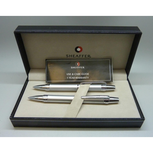 955 - A cased Sheaffer ballpoint pen and pencil set