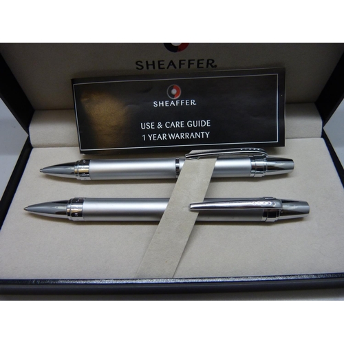 955 - A cased Sheaffer ballpoint pen and pencil set