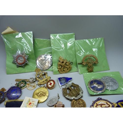 956 - Assorted enamel and other badges, medals, etc.