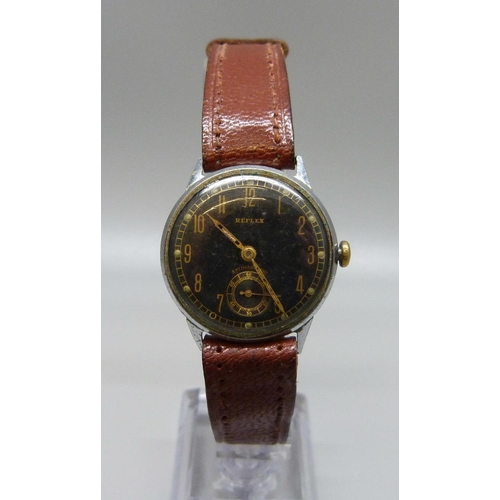 970 - A black dial Reflex military style wristwatch