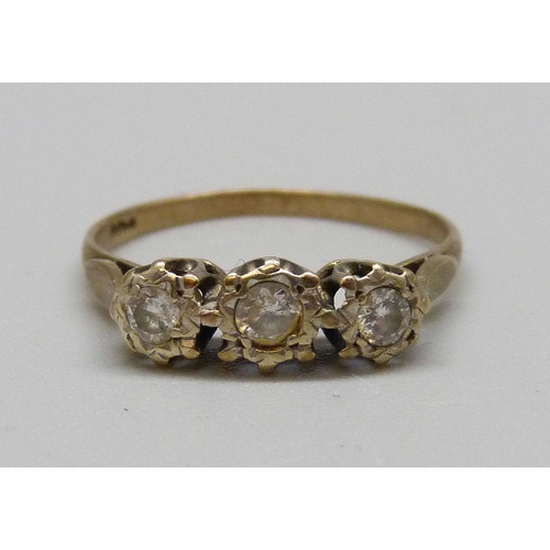 974A - A 9ct gold and three stone ring, 1.6g, N (one stone tests diamond)