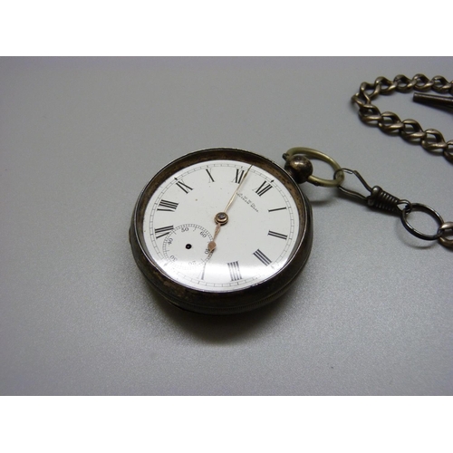 975 - A Waltham silver pocket watch and Albert, lacking glass and second hand