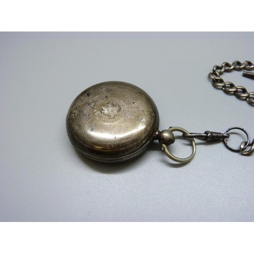 975 - A Waltham silver pocket watch and Albert, lacking glass and second hand