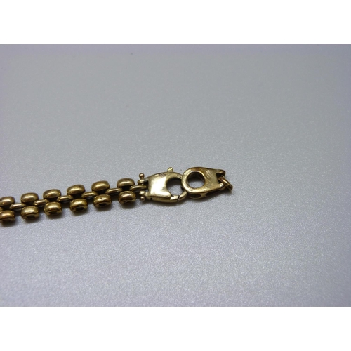 981 - A 9ct gold bracelet, 10.7g, fastener a/f