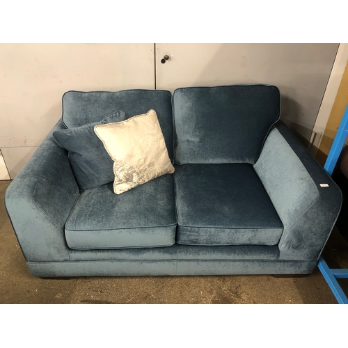 1303 - A steel blue upholstered two seater sofa