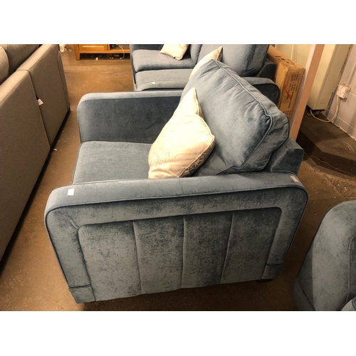 1304 - A steel blue upholstered armchair