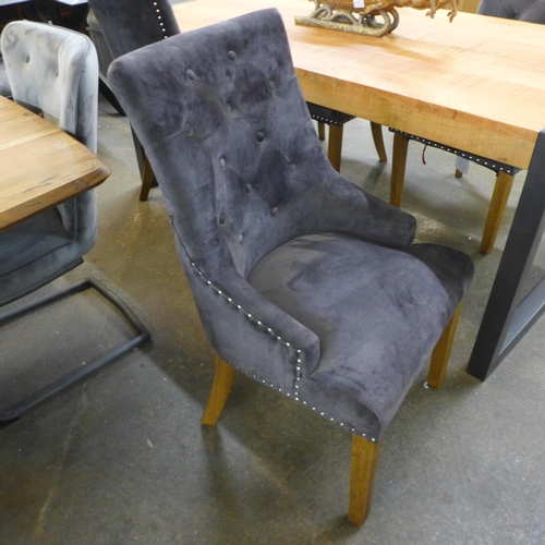 1324 - A Fire 2.0 gun metal grey and oak dining table and a set of four Jaipur charcoal velvet button back ... 