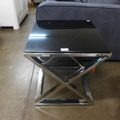 1338 - A chrome and black glass top lamp table