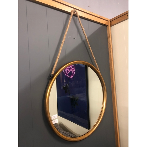 1349 - A large gold metal mirror on hanging rope, 58cms (JRG1114)   #