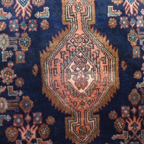 1586 - A blue ground handwoven Persian Hamadan runner (294cm x 100cm)