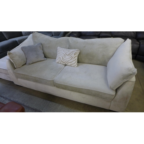 1639 - A Barker & Stonehouse cream velvet three seater sofa and footstool