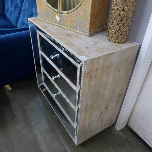 1413 - A pearl mirrored chest of drawers