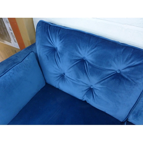 1417 - A blue velvet Hoxton three seater sofa