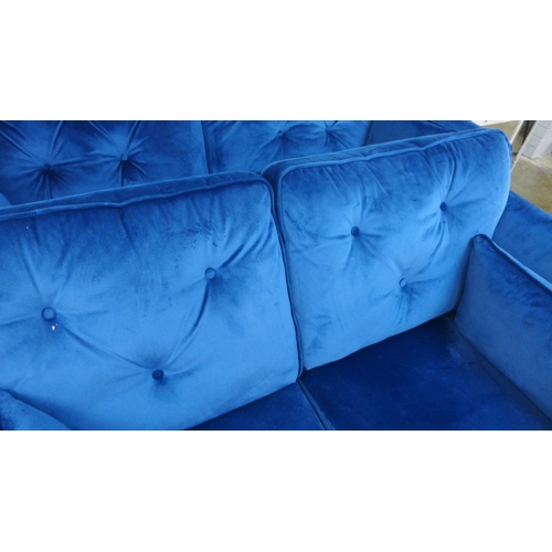 1418 - A blue velvet Hoxton three seater sofa