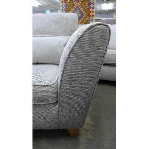 1461 - An oatmeal upholstered three seater sofa and armchair - RRP £1898