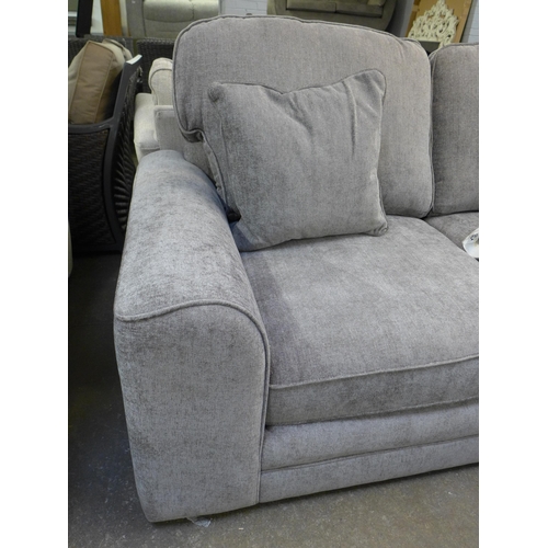 1475 - A mink upholstered three seater sofa