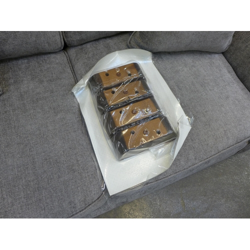 1475 - A mink upholstered three seater sofa