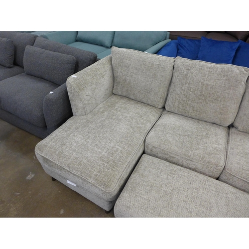 1505 - An oatmeal upholstered L shaped sofa and two footstools