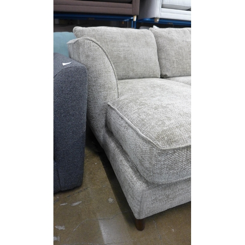 1505 - An oatmeal upholstered L shaped sofa and two footstools