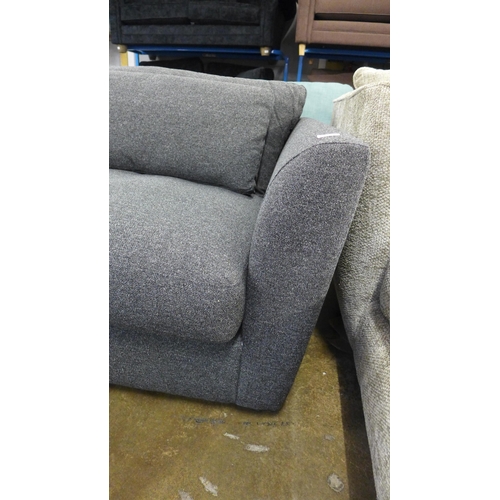 1506 - A grey upholstered three seater sofa