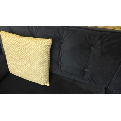 1539 - A blue velvet four seater sofa - RRP £1589