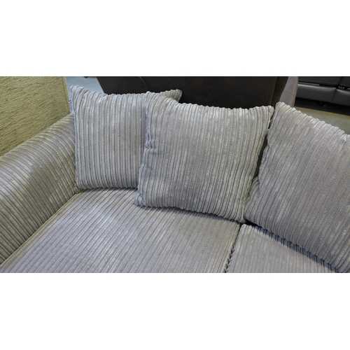 1568 - An ash jumbo cord three seater sofa