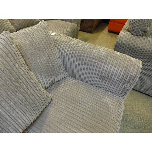 1569 - An ash jumbo cord two seater sofa