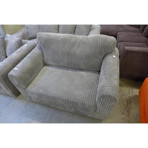 1570 - An ash jumbo cord two seater sofa