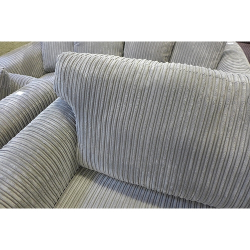 1570 - An ash jumbo cord two seater sofa