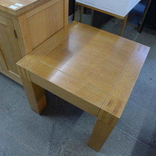 1655 - A two door, three drawer oak sideboard and lamp table