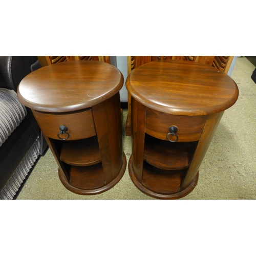 1666 - A pair of hardwood drum tables and two hardwood CD racks