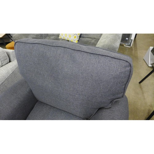 1394 - A charcoal upholstered armchair