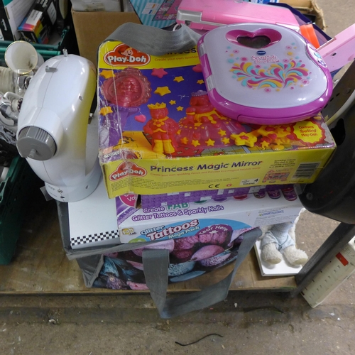 2110 - Girl's toys job lot: 100 year old pot head doll, sewing machine, Monopoly, etc.